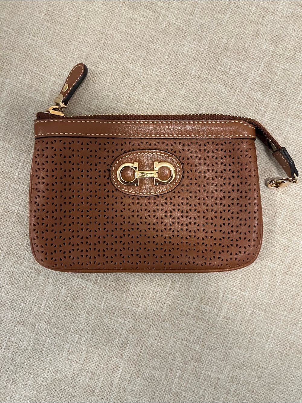 Salvatore Ferragamo Perforated Brown Leather Wristlet with Gold Hardware